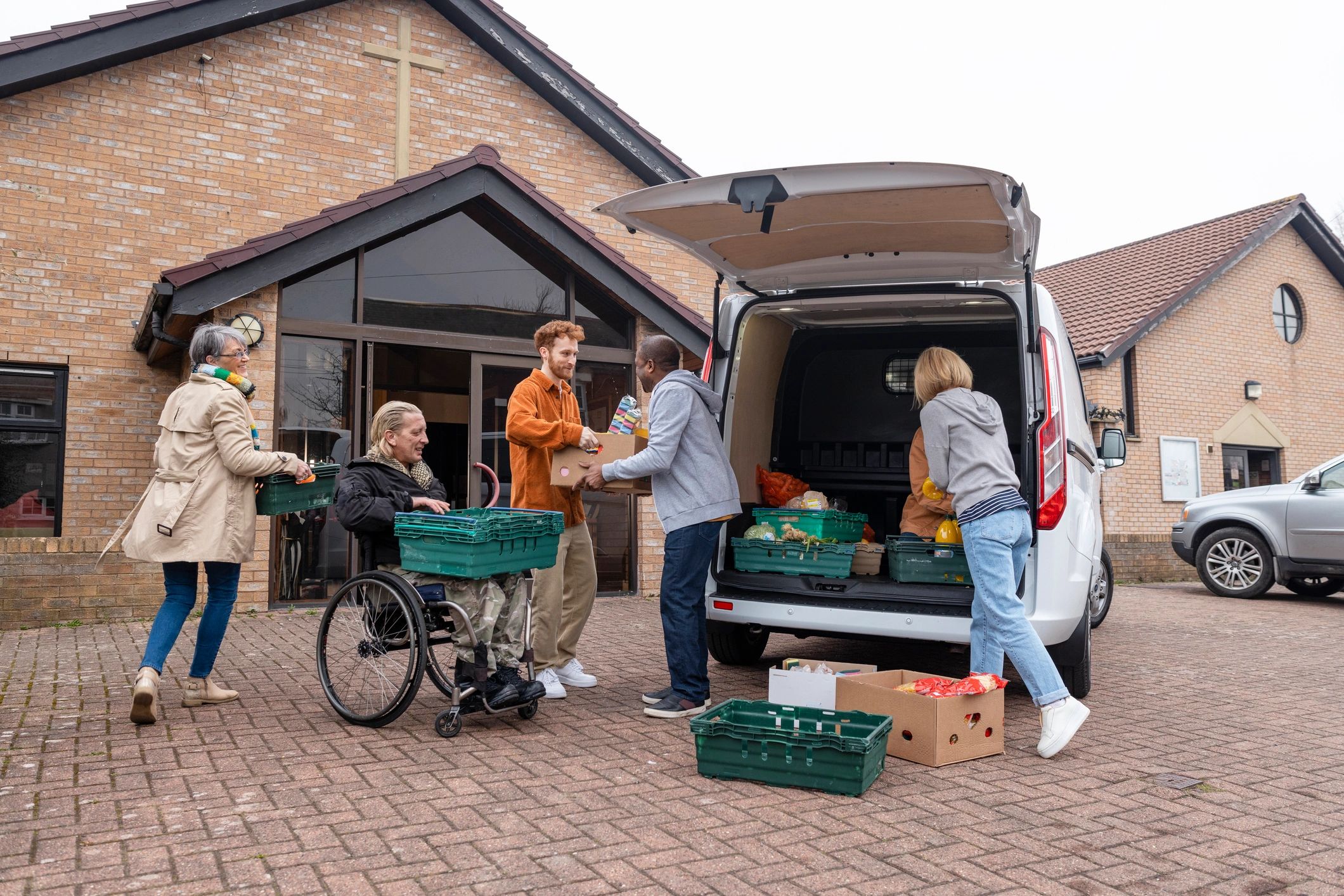 Volunteers working together to support a community food bank